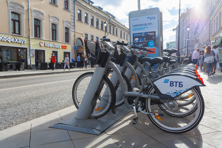 Moscow, Russia, August 2018: View on a hire bikes on a docking station on the city street (editorial)のeditorial素材