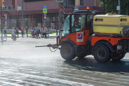 Moscow, Russia, August 2018: Cleaning  machine washing the streets in the city (editorial)