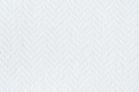 White paper surface with herringbone pattern as texture, backgroundの写真素材