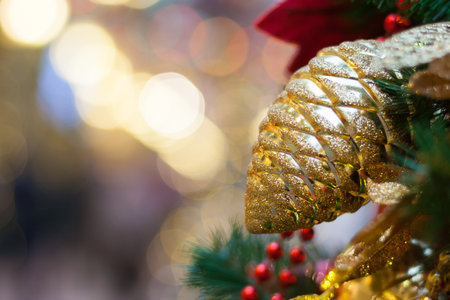 Gilded glass cone on the Christmas tree (close up)の写真素材