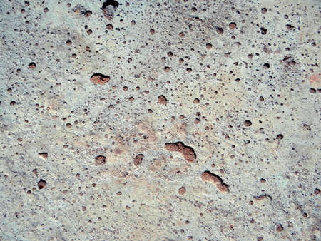 Texture of concrete wall with small holesの写真素材