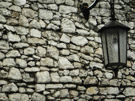 Old stone wall with lantern Background conceptの写真素材