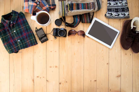 hipster clothes and accessories on a wooden backgroundの写真素材