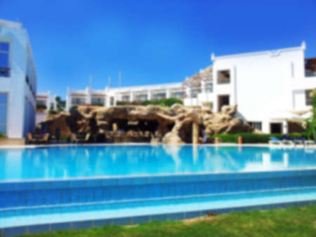 Bright photo of pool on holiday in Egypt blurred background for the site or brochures on tourismの写真素材