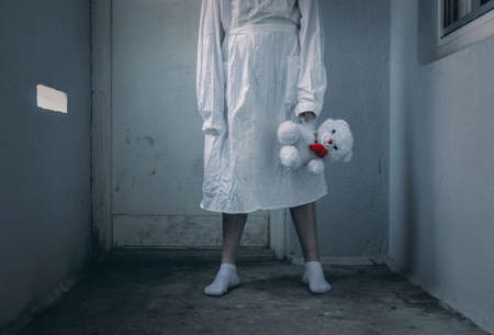 mentally ill girlwith a straitjacket in a Psychiatricの写真素材