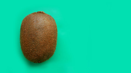 The concept of healthy eating. kiwi on blue modern and fashion background. Top View
