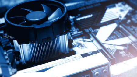 Circuit board. Electronic computer hardware technology. Motherboard digital chip. Tech science background. Integrated communication processor. Information engineering component. Blue color.の写真素材