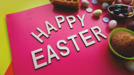 Decor Easter eggs on pink background. Flat lay, top view. Easter concept banner. Happy Easter text