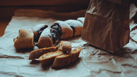 Sweet Baking product on craft paper. Food photo. Sweet Pastries. Bakery shop banner. Photo for recipe book. Paper bags for deliveryの写真素材