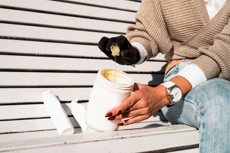 Natural honey sugar paste shugaring closeup - white tubeの写真素材