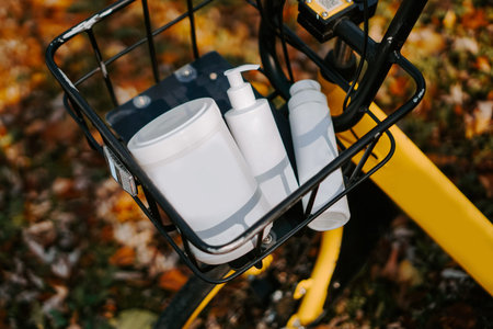 Bicycle basket with cosmetic jars. The concept of sport, outdoor recreation and healthy lifestyle....