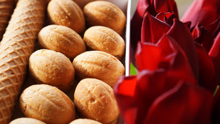Shortbread cookies and tulips. Gift to the woman. Russian Sweets - oreshki cookies and tubes