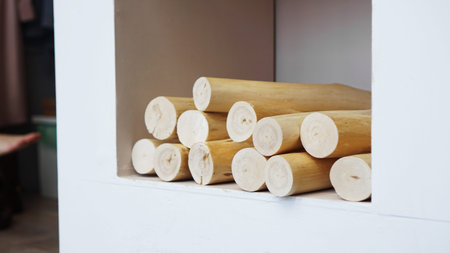 New fireplace with wooden logs - white Scandinavian classic room. Cosy home