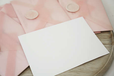 Gift certificates in a pink envelope. Wedding invitation or Valentines Day cards - Mocap - place for textの写真素材