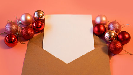 Blank sheet of paper for notes, kraft paper envelope on bright pink background. The concept of New...