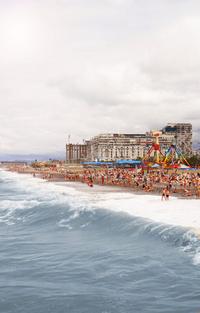 BATUMI, GEORGIA - August 18,2019. People relax on beach. Popular Batumi beachのeditorial素材