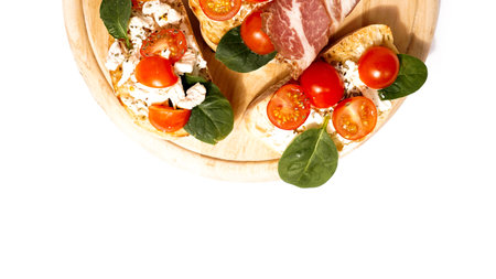 Bruschetta is usually served as snack or appetizer. Italian set on wooden boardの写真素材
