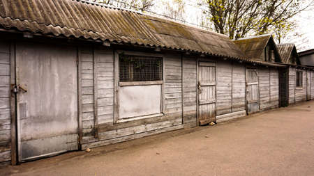Grye mooden rural buildings. Old sheds. Zoo storage roomsの写真素材