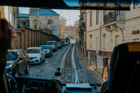Lviv, Ukraine - Oktober 30, 2021. View of the streets of Lviv from tourist bus window. Travel concept. Sightseeing tour of historic old city centerのeditorial素材