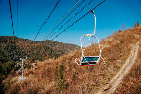 Ski lift in beautiful mountains. Mount Zakhar Berkut. Ukraine. Attractions. Autumn landscape in the mountains. Travel and nature conceptの写真素材