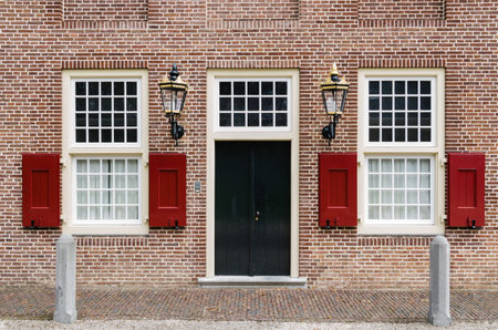 Entrance door with 2 windows and lanterns at palace Het Loo at Apeldoorn, the Netherlandsの写真素材