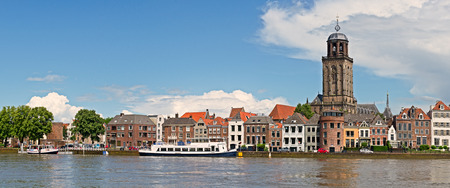 Panoramic view of the medieval Dutch city Deventer with the Great Church of Lebuinesker alongside the IJssel riverの写真素材