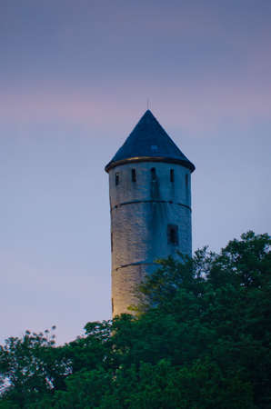 Ancient tower in a tender evening lightの写真素材
