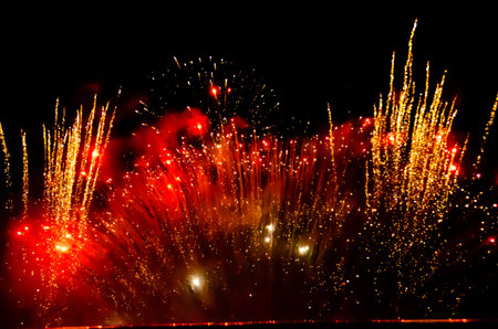 Fulminate, colorful, luminous, real fireworks at night