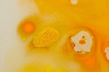 red, orange, yellow, brown white and gold liquid bright aquarel colors with oil generate fluid...