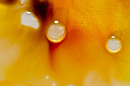 red, orange, yellow, brown white and gold liquid bright aquarel colors with oil generate fluid...