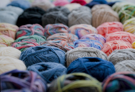 Multicolored skeins of yarn for knitting. Selective focus.