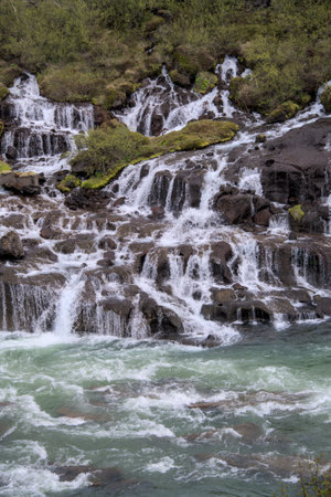 Panorama of the beautiful, wide waterfalls of Hraunfossar, Icelandの写真素材