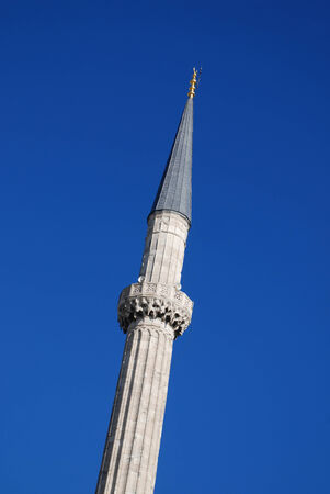 Minaret against a blue skyの写真素材