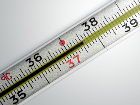 Medical thermometer with with temperature 37.5 on a gradient background