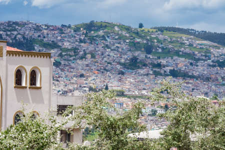 Suburbs of Quito against the mountain slopes of the Andesの写真素材