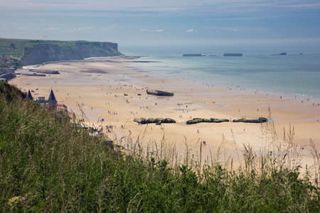Beach of Arromanches with remains of Mulberry Harbourの写真素材