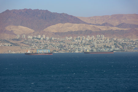 Editorial: EILAT, ISRAEL, April 25, 2017 - Eilat and the mountains of the Sinai seen from Aqaba, Jordanのeditorial素材