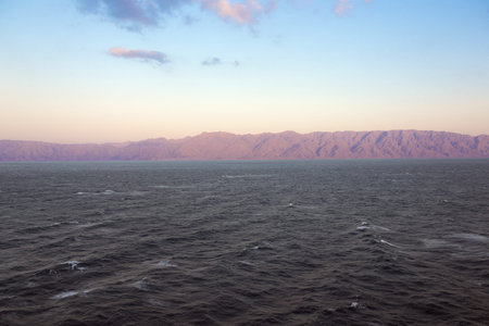 Golden hour over the Sinai Peninsula seen from the Gulf of Aqaba