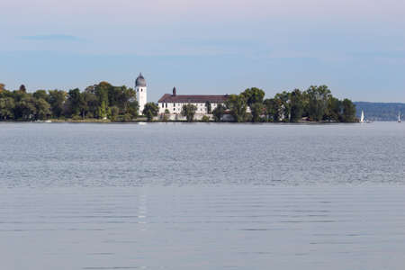 View of Frauenchiemsee island seen from Herreninsel islandの写真素材