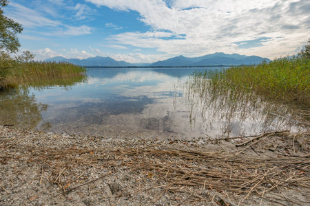 View of the Alps from the Herreninsel in the Chiemsee at Paul's restの写真素材