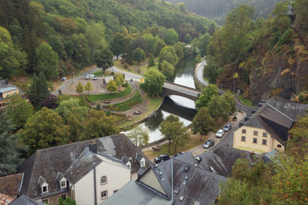 The village of Esch-sur-Sure with the bridge over the Sauer river seen from the castle, dominating the villageのeditorial素材