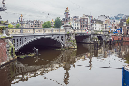 Editorial: AMSTERDAM, NETHERLANDS, September 22, 2018 - View of the Blauwbrug over the Amstel, connecting the Rembrantplein and the Waterloopleinのeditorial素材