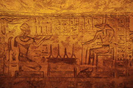 Bas relief of Ramesses II giving offer to Anubis in the Great Temple of Abu Simbelのeditorial素材