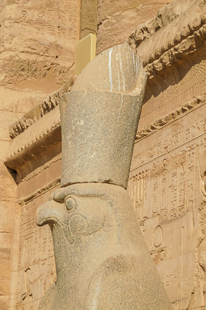 Close up of the hawk head of Horus taken from the side at the temple in Edfu