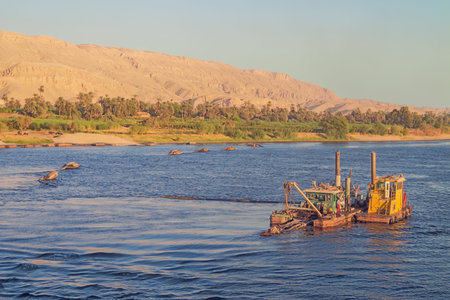 Editorial: EZBET EL-GAWAD, EGYPT, October 12, 2018 - Work boat on the Nile at Ezbet El-Gawad between...