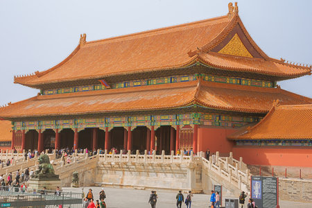 Editorial: BEIJING, CHINA, April 5, 2019 - Tourists passing through the Gate of Supreme Harmony in the Forbidden City in Beijingのeditorial素材