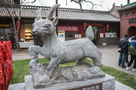 Editorial: PINGYAO, SHANXI, CHINA, April 10, 2019 - Statue of a goat in the City God Temple in the old town of Pingyaoのeditorial素材