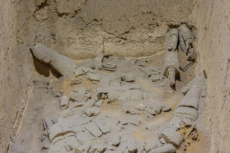 Editorial: XI'AN, SHAANXI, CHINA, April 12, 2019 - Shattered parts of warriors in their original state in hall 2 in Xi'anのeditorial素材