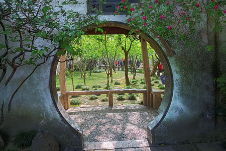 Editorial: SUZHOU, JIANGSU, CHINA, April 15, 2019 - Looking through a gate into the Liu Garden in Suzhouのeditorial素材