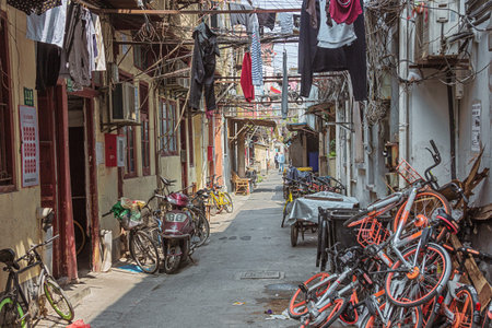 Editorial: SHANGHAI, CHINA, April 16, 2019 - Cluttered old city neighborhood in Shanghaiのeditorial素材